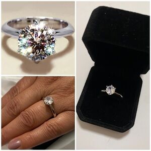 Round Cut Diamond Solitaire set in 925 Silver size 9